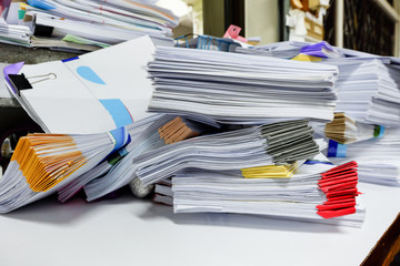 Busy, messy and cluttered workplace, full of documents