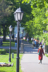 People walking in the park on a sunny day