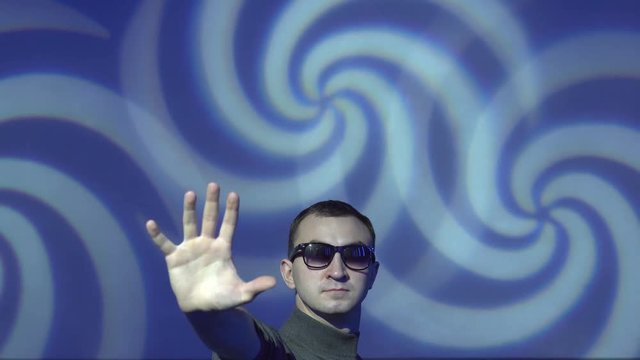 Hypnotist brainwashing the viewer into a deep subconscious subliminal trance using mind control tactics.