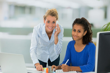 multi ethnic team working together in office