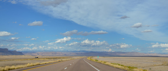 Interstate-70 passing deserted plains of south central Utah