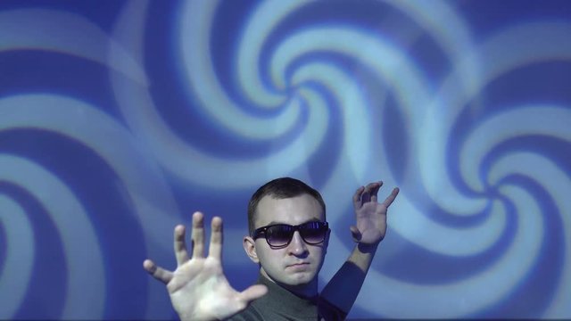 Hypnotist brainwashing the viewer into a deep subconscious subliminal trance using mind control tactics.
