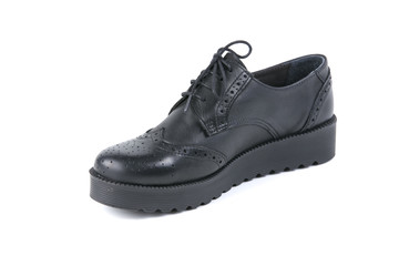 Female black leather shoe on white background, isolated product, comfortable footwear.
