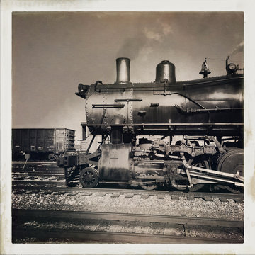 Old steam locomotive against sky