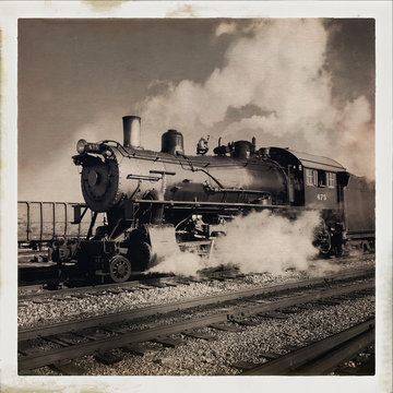 Old steam locomotive against sky