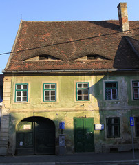 the old house with eyes-like dormers in the roof