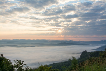 sunrise twilight and sea fog of Doi Samer Dao  in Sri Nan National Park ,  Nan Province of Thailand