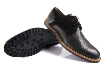 Male black leather shoe on white background, isolated product, comfortable footwear.