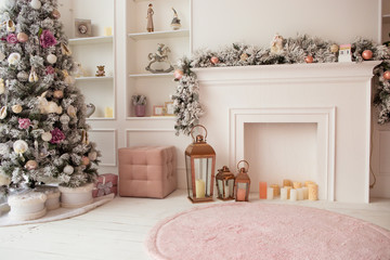 Living room in white and pink colors, with Christmas decorated interior