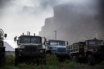 Trucks in the mist