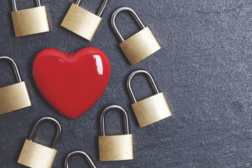 Valentines love concept. Red heart with padlock