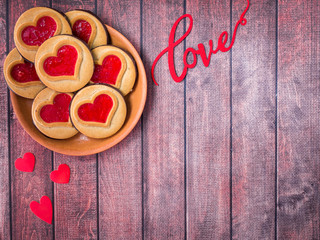 Homemade Cookies with a Red Jam Heart Valentine's Day Dark Wooden Background Copy Space
