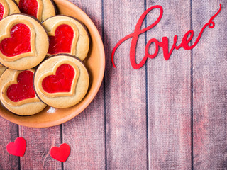 Homemade Cookies with a Red Jam Heart Valentine's Day Dark Wooden Background Copy Space
