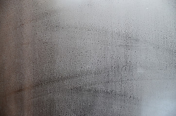 Window glass with condensate or steam after heavy rain, Texture or background image