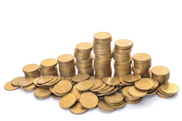 Coin stacks on a white background. Ukrainian hryvnia.