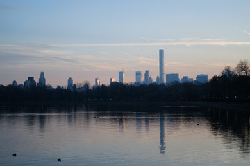 Manhattan sunset from Central Park with reflection