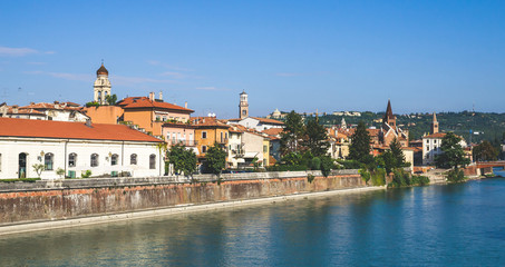 Obraz premium Beautiful old houses on Adige river in Verona, Veneto region, Italy.