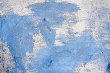 Obraz premium Textured background. Old gray concrete wall with stains of blue paint for the lettering