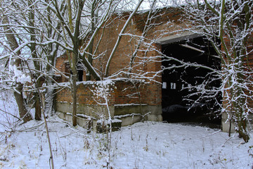 Old destroyed by time and vandals industrial building of the times of the USSR. December 2017