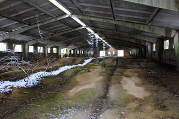 Old destroyed by time and vandals industrial building of the times of the USSR. December 2017