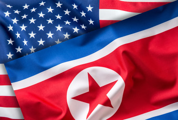 American and north korea flag. Colorful USA and North Korea flag waving in the wind