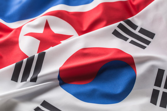 North And South Korea Flag. Colorful South And North Korea Flag Waving In The Wind