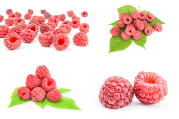 Group of raspberries with leaves isolated on white