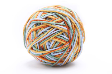 Colorful big thread ball from four color thread. Cotton thread ball isolated on white background. Different color (orange, yellow, green, blue) thread mix.