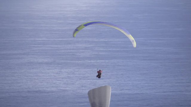Para glider drifting in winds above Cape Town