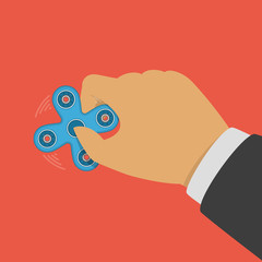 Fidget spinner in hand.