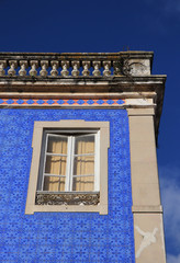 Corner of a traditional Portuguese house with blue tiles