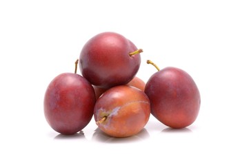  plums isolated on the white background
