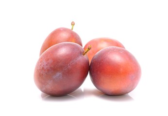  plums isolated on the white background