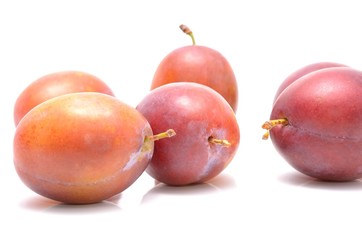  plums isolated on the white background