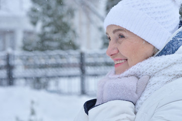 woman in winter clothes posing 