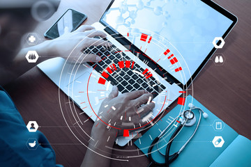 Target focus on Medical techonlogy concept,smart doctor hand working with modern computer in hospital office 