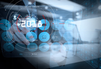 Concept of target focus digital diagram 2018,graph interfaces,virtual UI screen,connections network.Hipster finance analyst working at trendy office