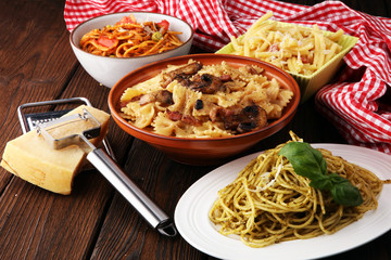 Italian pasta selection with pesto, carbonara, tomato spaghetti fresh vegetables cuisine