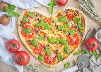 Pizza in the shape of a heart.