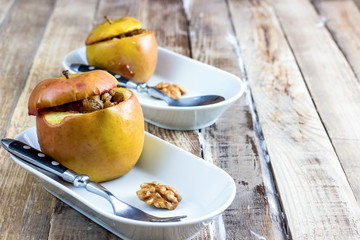 Healhty dessert baked red apples stuffed with granola