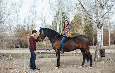 Fototapeta premium wedding couple with their horse