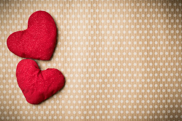 Valentine's Day. Colorful knitted hearts on a vintage background in polka dots. Red heart. Valentines day. Heart pendant. Valentine cards. Eighth of March. International Women's Day.