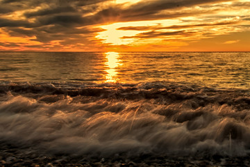 sunset and clouds on the sea storm