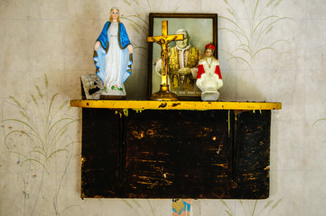 Roman Catholic religious objects on a shelf in an old Irish cottage.