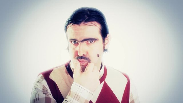 An ugly nerd making sexual calls with his face, mouth, hands. Sickening fake character.
