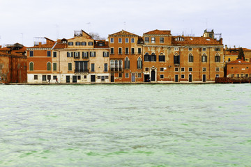 Views of canals and ancient architecture of Venice.