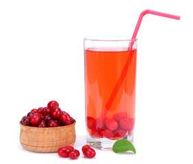 dogwood berries in wooden bowl with dogwood juice isolated on white background