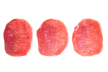 Three pieces of pork meat isolated on white background.