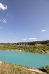 chalk quarry with blue water