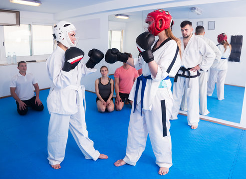 Women practicing at taekwondo class